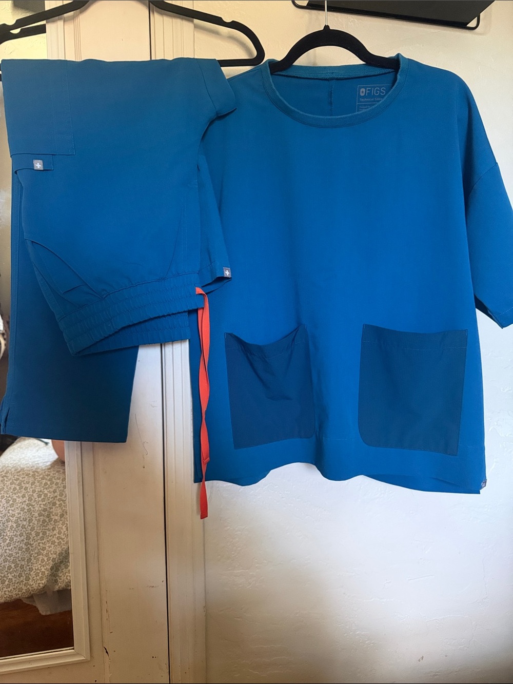 Figs Women's Teal Scrub Top and Pants with Orange Drawstring